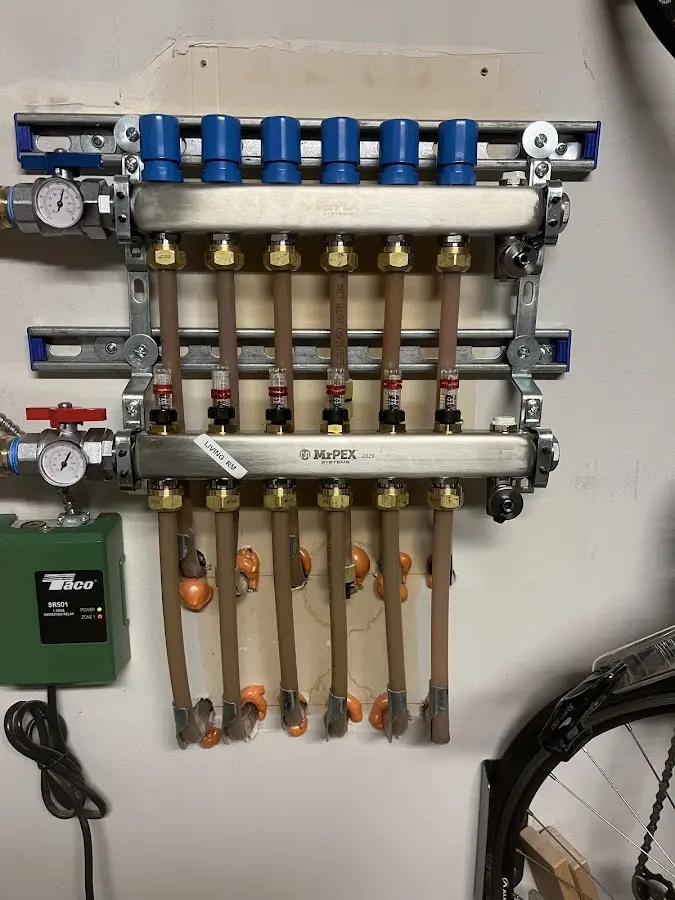 Plumber performing Water Heater Repair at a residential property in Ephraim